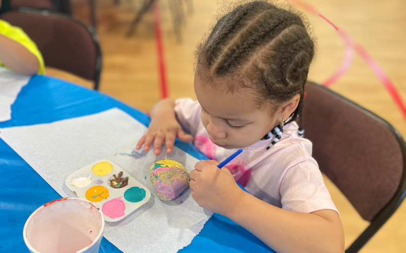 Little Girl Playing with Paint