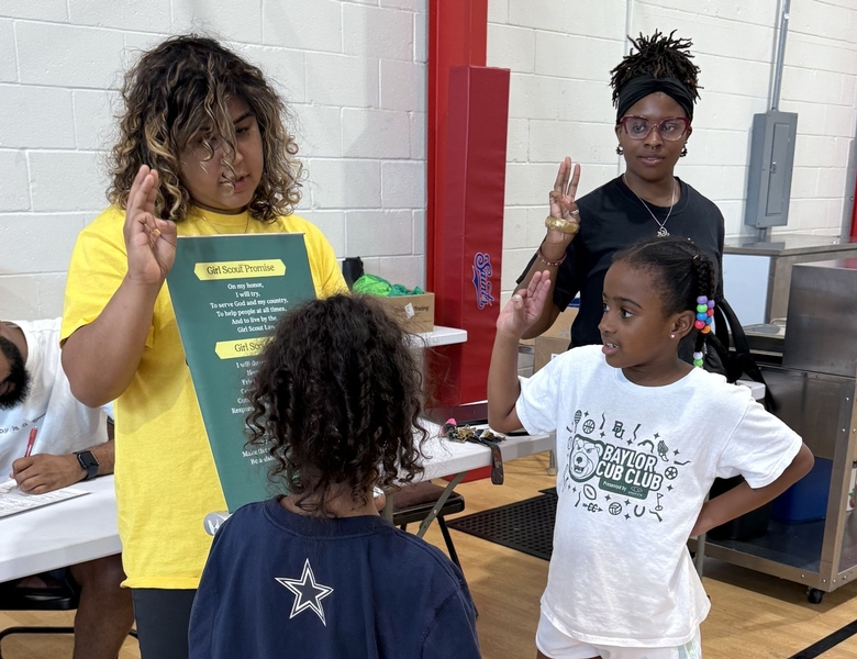 Volunteer with 2 girls